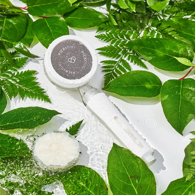 PICKI NIKI filtered shower head in a bright bathroom